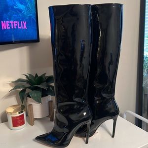 These are patent leather, knee-high boots they are made by the brand IDENTITA